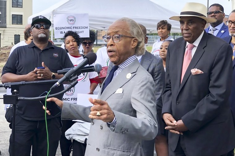 CORRECTS PHOTO CREDIT TO CURLAN CAMPBELL The Rev. Al Sharpton speaks outside the Richard B. Russell federal courthouse in Atlanta, on Tuesday, Sept. 26, 2023, in support of a grant program for Black women entrepreneurs. A judge ruled Tuesday that the program can continue, saying a lawsuit arguing it illegally excluded other races was not likely to succeed.