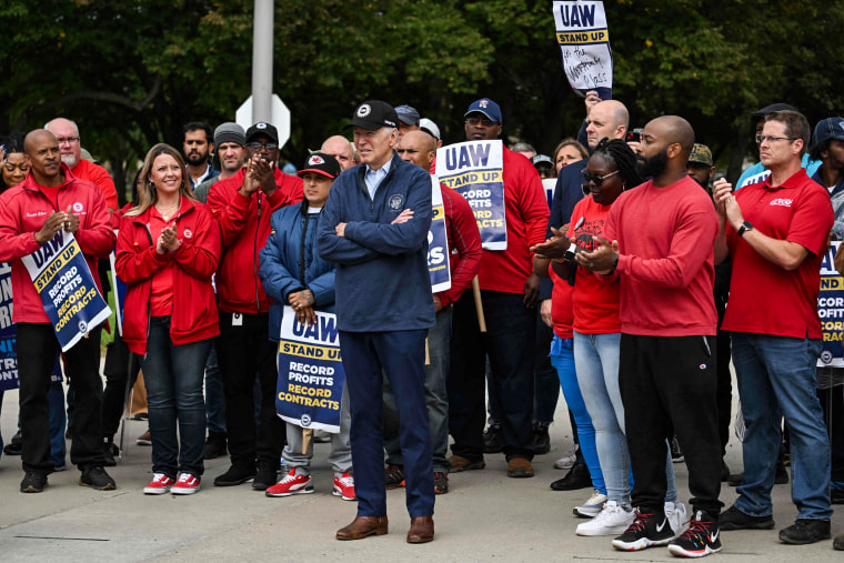 President Joe Biden joins striking members of the United Auto Workers union at a picket line outside a General Motors plant in Belleville, Mich., on Sept. 26, 2023.
