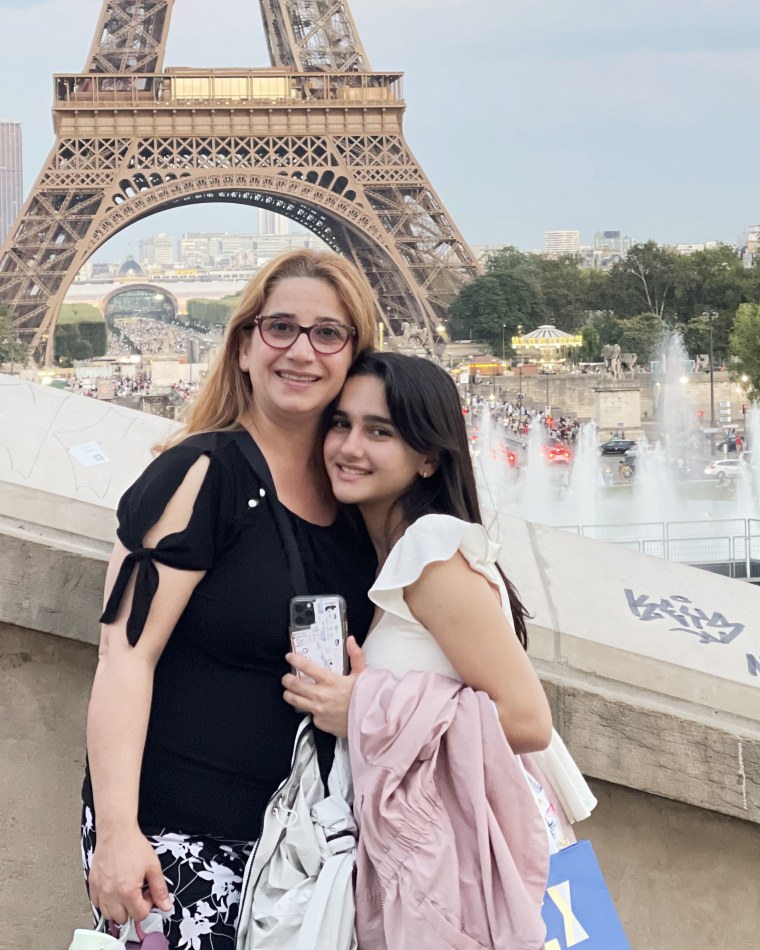 Armita Mojazza, seen here with her mother, Shahrzad, in Paris this past summer, says she spends hours every day on her phone.