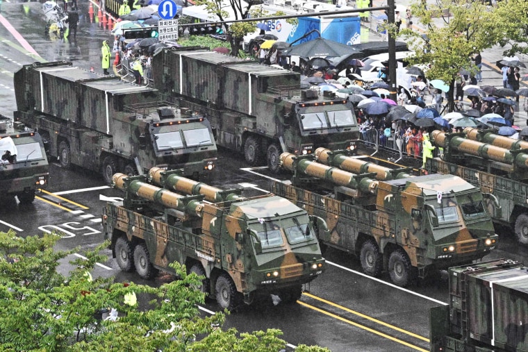 South Korea holds rare military parade and warns North over nuclear threat
