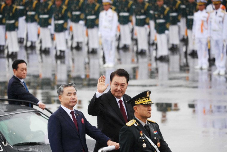 South Korea holds rare military parade and warns North over nuclear threat
