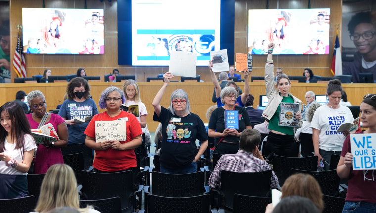 People protest during a HISD school board meeting in Houston