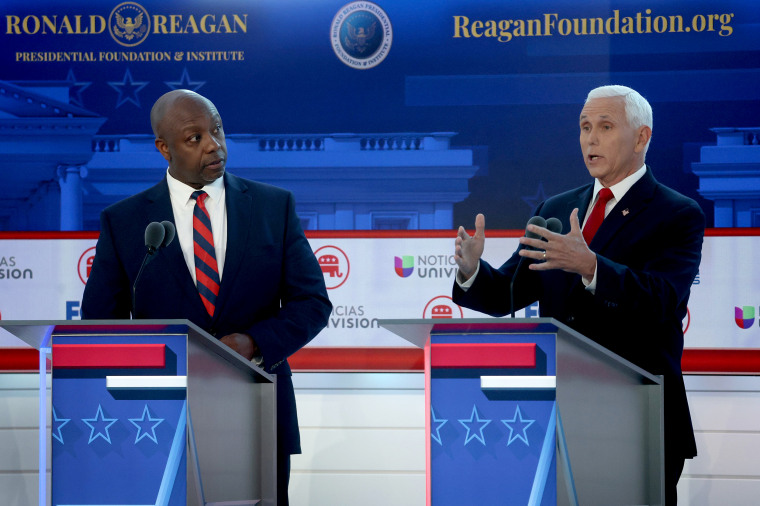 Image: Sen. Tim Scott, R-S.C., and former Vice President Mike Pence at the Republican presidential primary debate in Simi Valley, Calif., on Weds.