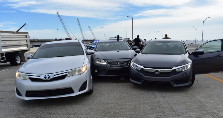 Florida Highway Patrol troopers respond to a crash involving three sedans along the southbound lanes of I-275 on the Howard Frankland Bridge.  