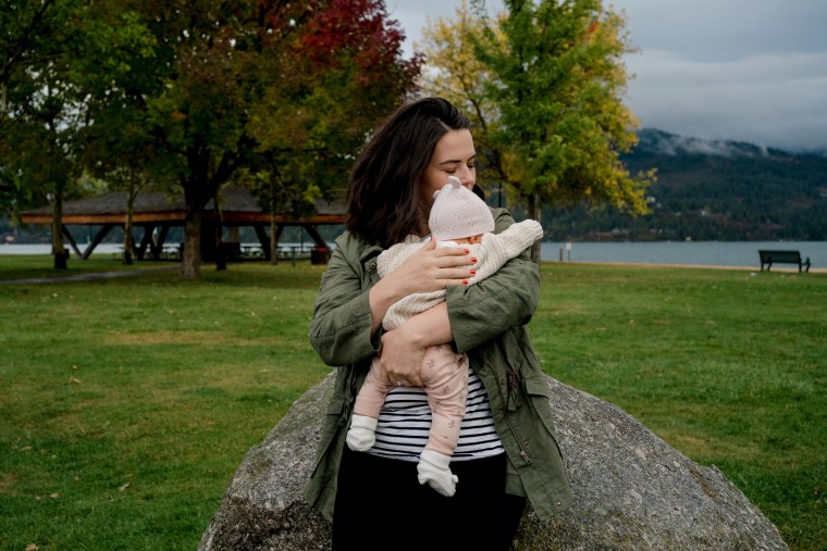 Image: Laura Olin and her newborn daughter in Sandpoint, Idaho, on Sept. 26.