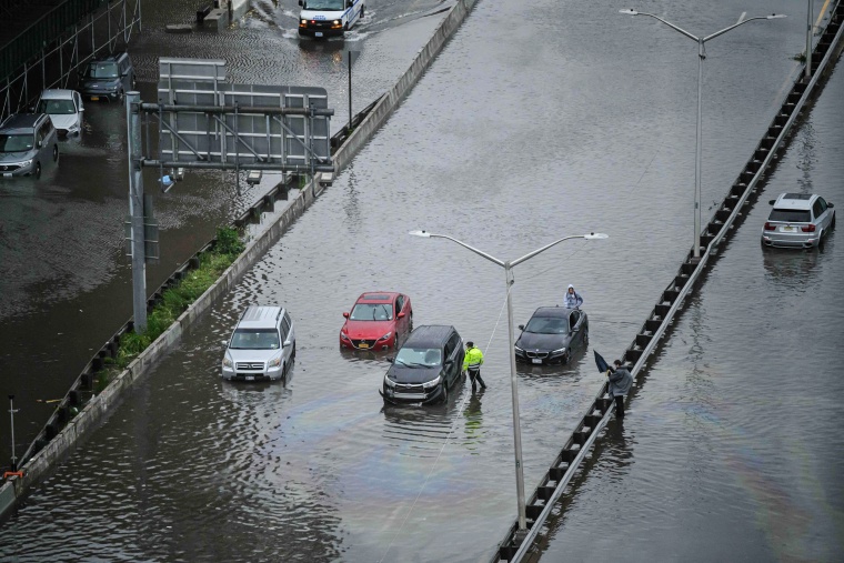 Cars stranded in floodwater on the FDR highway in Manhattan on Sept. 29, 2023. 
