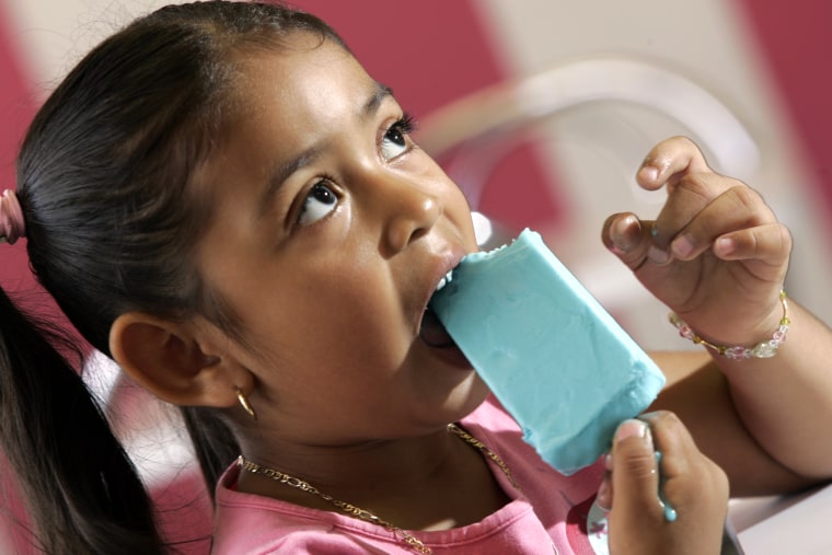 Image: Arely Flores, 4, eats a bubble gum flavored paleta in Garden Grove, Calif., in 2007.