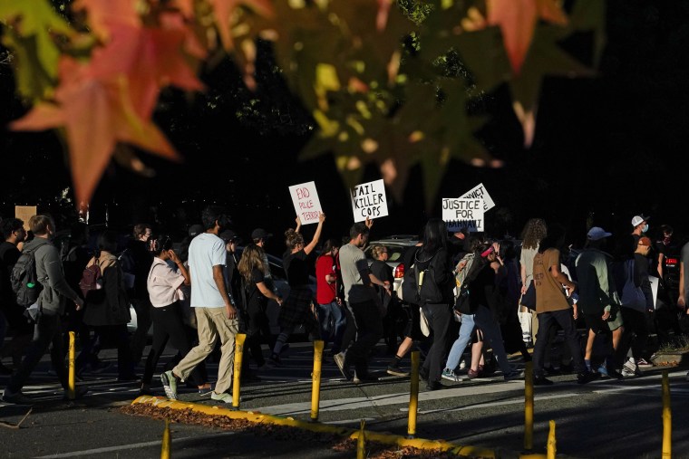 Protesters march on Sept. 14, 2023, after body camera footage was released of a Seattle police officer joking about the death of Jaahnavi Kandula, a 23-year-old woman hit and killed in January by officer Kevin Dave in a police cruiser.