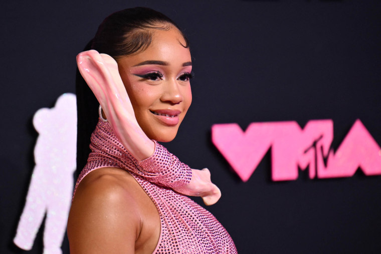 Why Does Saweetie’s Dress To The 2023 VMAs Have A Bone?