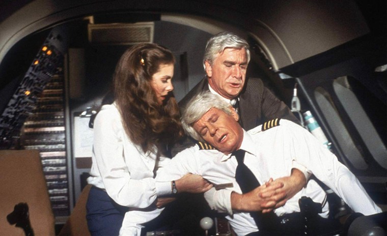 Julie Hagerty, Peter Graves, Leslie Nielsen in "Airplane!"