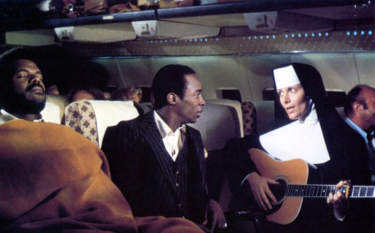 Nun plays guitar in "Airplane!"