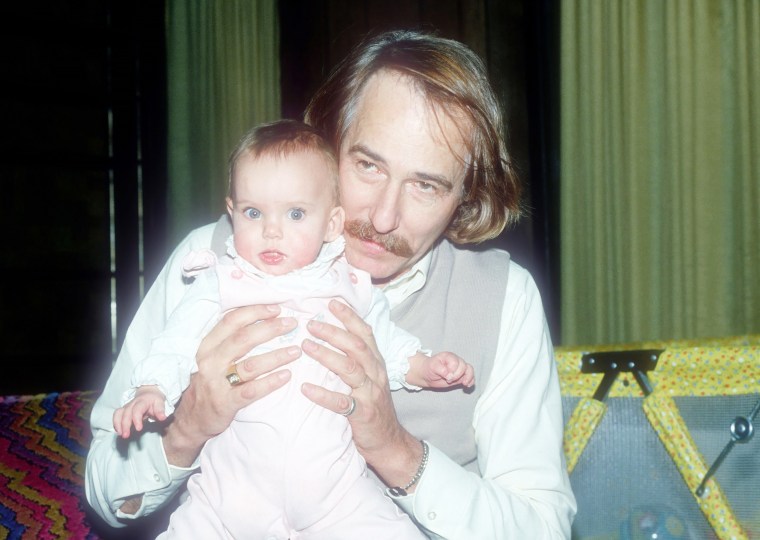 John Phillips hold his daughter, Bijou, on December 1, 1980 in NJ.