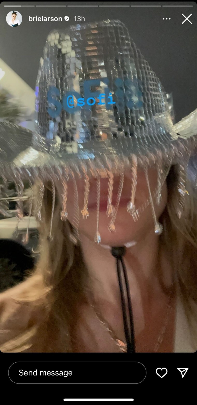 Brie Larson takes a selfie in a sparkly hat at Beyonce's LA concert.