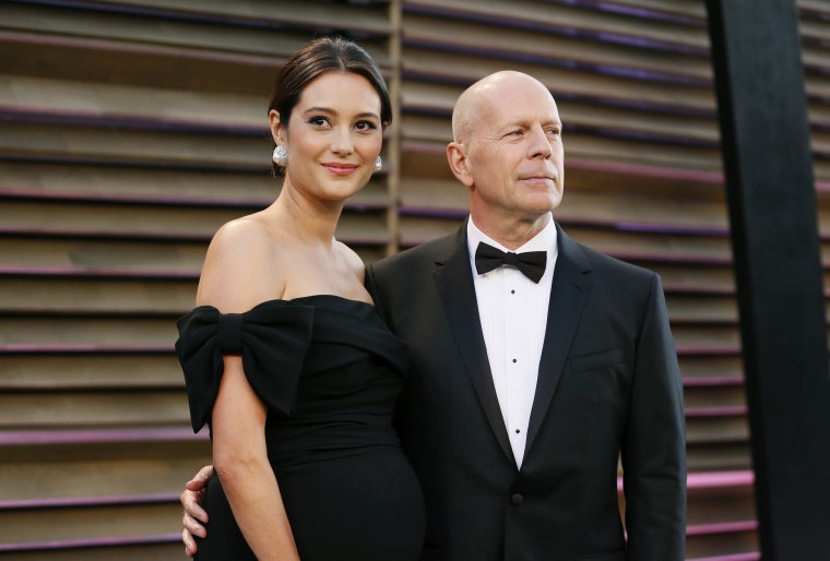 Actor Bruce Willis and his wife Emma Heming arrive at the 2014 Vanity Fair Oscar Party in West Hollywood