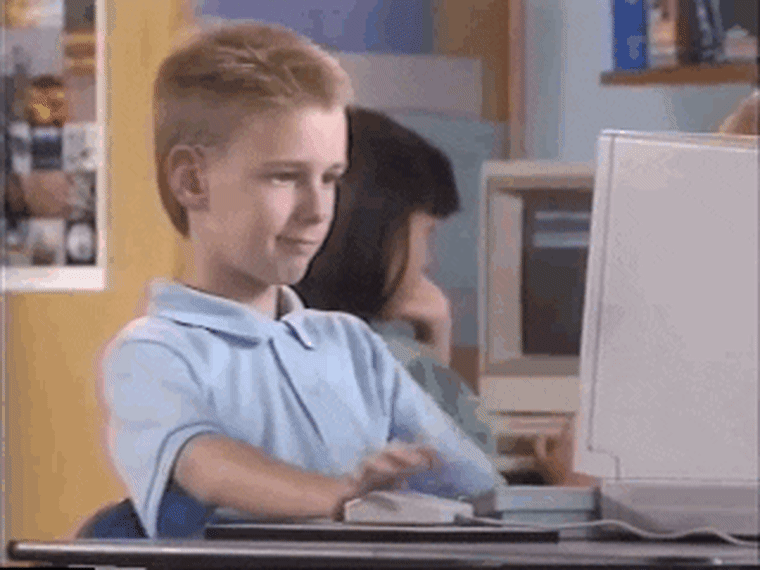 GIF: A boy doing a thumbs up 