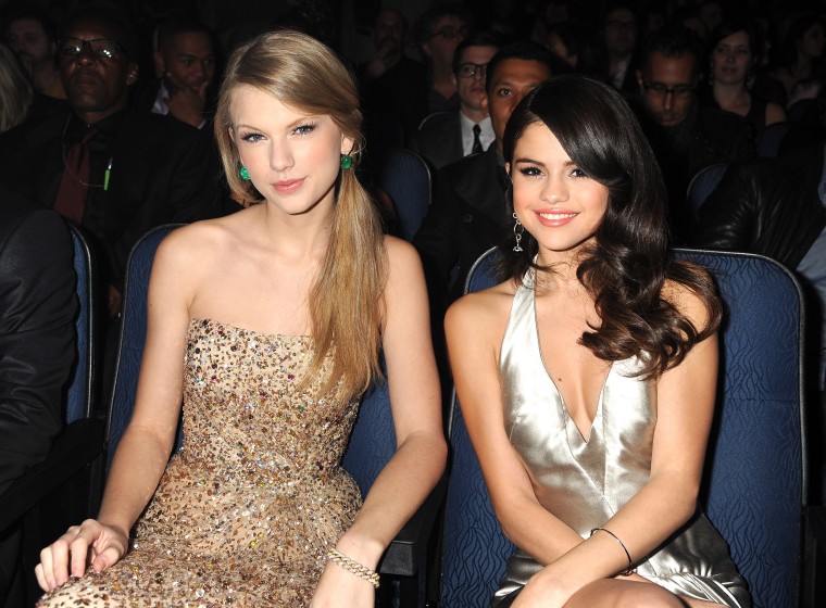 Taylor Swift and Selena Gomez in the audience at the 2011 American Music Awards at the Nokia Theatre L.A. LIVE  on November 20, 2011 in Los Angeles, California.