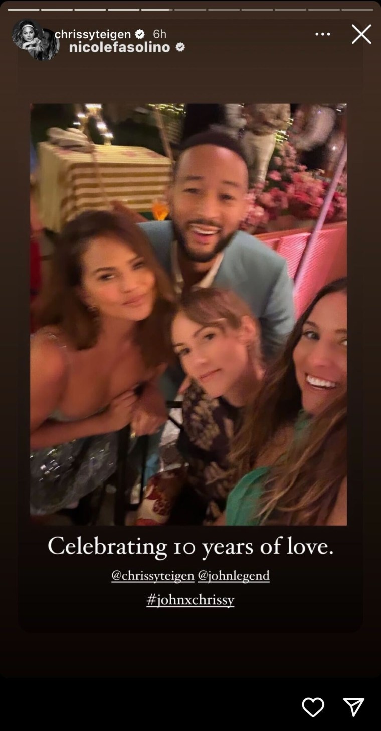 Chrissy Teigen and John Legend looking happy to celebrate renewing their vows.
