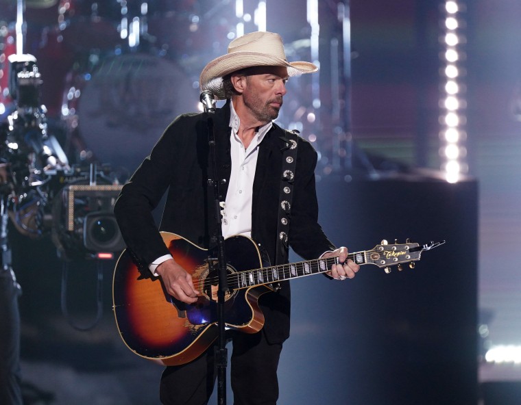 Toby Keith performs on stage during the awards show. 