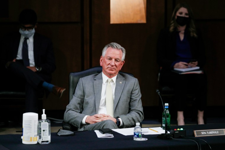 Tommy Tuberville sits at desk in hearing. 