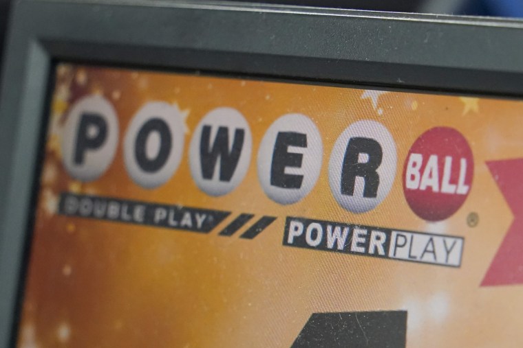  A display panel advertises tickets for a Powerball drawing last year.