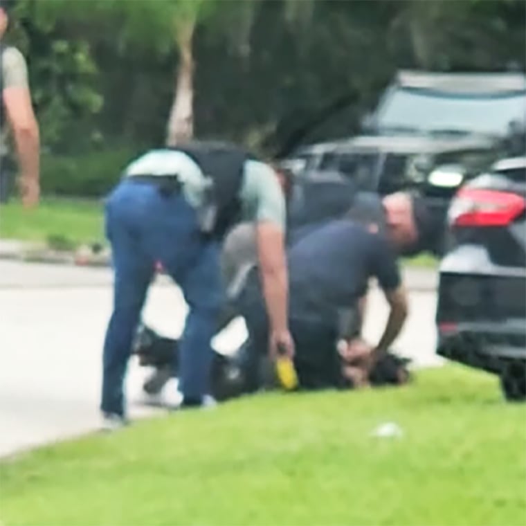 Police officers arrest Le’Keian Woods in Jacksonville, Fla., on Sept. 29, 2023.