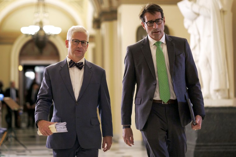 Patrick McHenry, left, and Garret Graves, walk through the U.S. Capitol building in Washington, D.C.