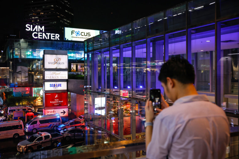 Thailand shooting: teenage suspect arrested after two killed at luxury mall