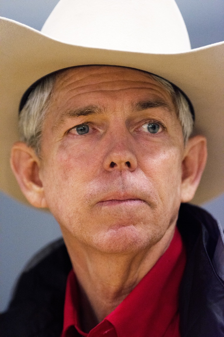 A tight portrait of David Barton  wearing a cowboy hat.