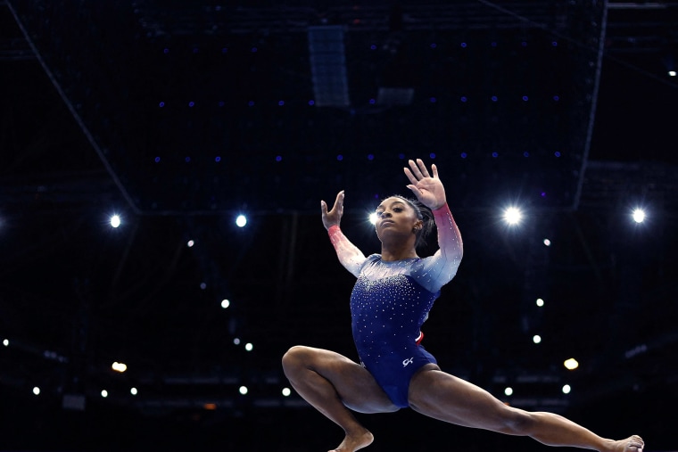 Simone Biles competes on the balance beam