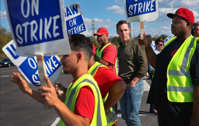  Sen. Josh Hawley, R-Mo., visits with striking United Auto Workers outside the General Motors truck plant in Wentzville on Sept. 25, 2023. 