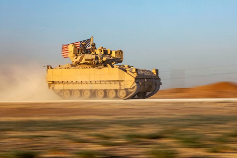 U.S. soldiers in a Bradley Fighting Vehicle on patrol in Syria's northeastern Hasakeh province July 17, 2023.