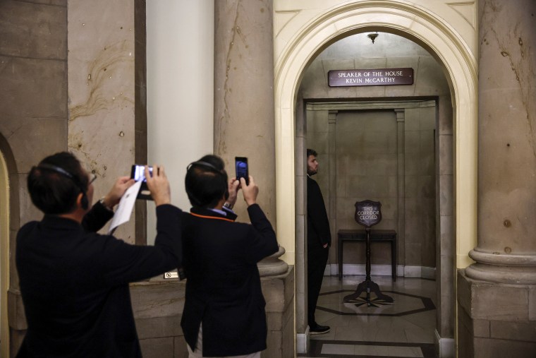 Image: Tourists take photos outside the offices of former Speaker of the House Kevin McCarthy