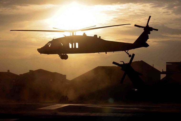 Image: An Israeli military helicopter above a hospital helipad in Ashkelon.