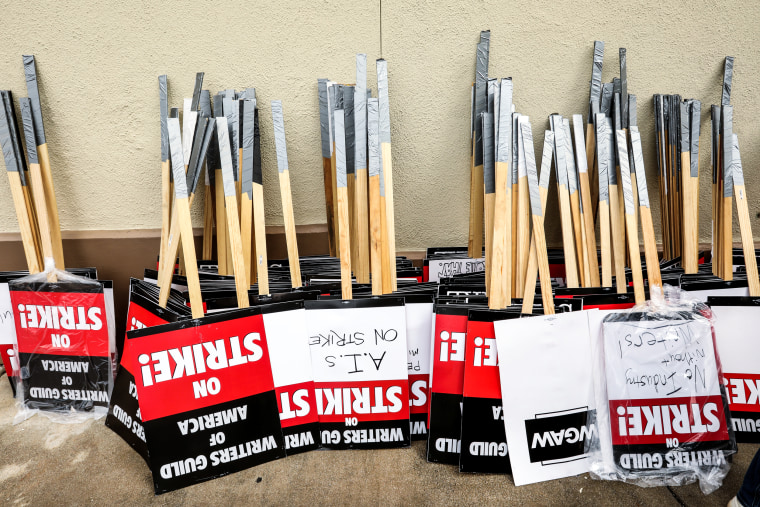 Signs stand ready for picketers on day three of the Writers Guild of America strike