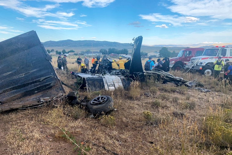 aircraft wreckage emergency personnel