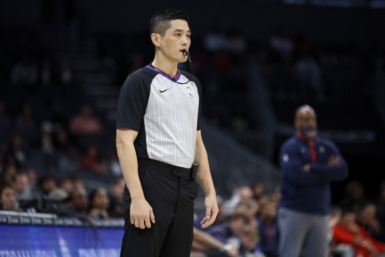 Intae Hwang calls the game between the Charlotte Hornets and the Washington Wizards