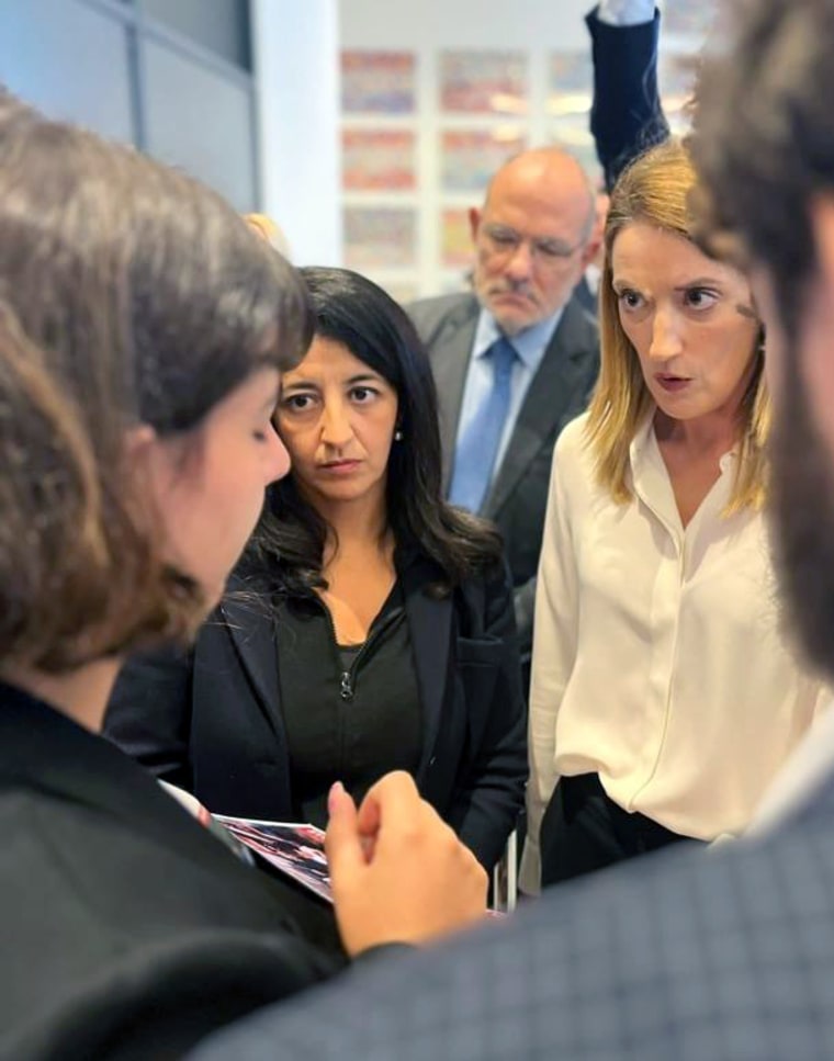 Parliament Roberta Metsola,, right, talks with Shira Havron.