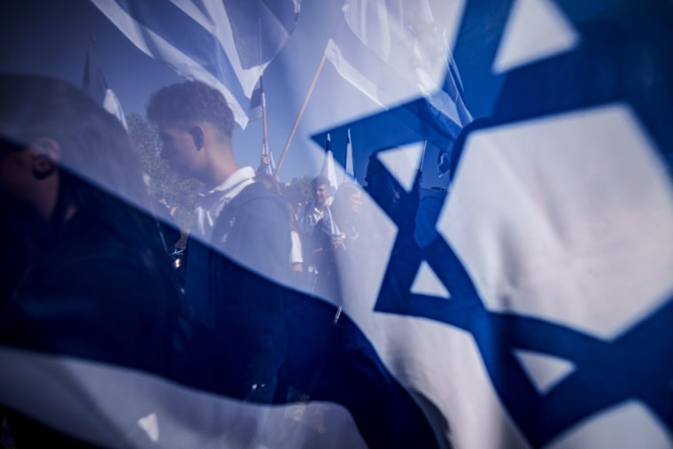 People rally in support of Israel in Bucharest, Romania.