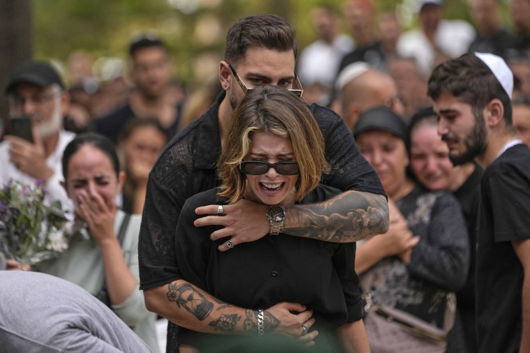 Mourners attend the funeral of Israeli soldier Abraham Cohen at the Mount Herzl cemetery in Jerusalem, Thursday, Oct. 12, 2023.