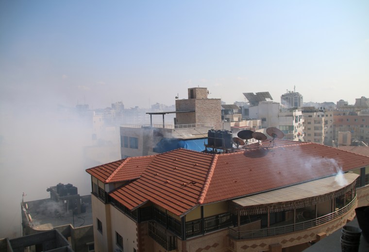 Smoke fills the air Wednesday after Israeli aircraft bombed the area west of Gaza City.