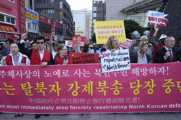  South Korea on Friday, Oct. 13, 2023 said it had expressed its concerns to China after assessing that it recently returned a “large number” of North Koreans, including escapees, back to their homeland. The signs read "Stop repatriation of North Korean defectors to North Korea." 