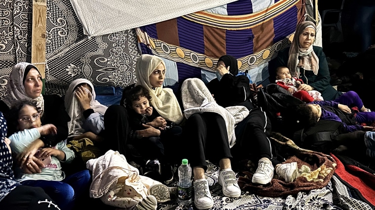 Families who fled their homes take refuge in Al-Shifa Hospital