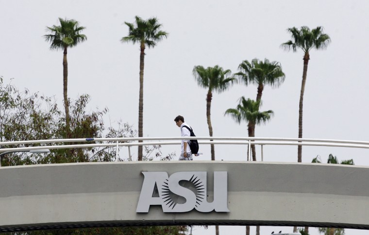 A student walks to class at Arizona State University in Tempe on July 10, 2007. 