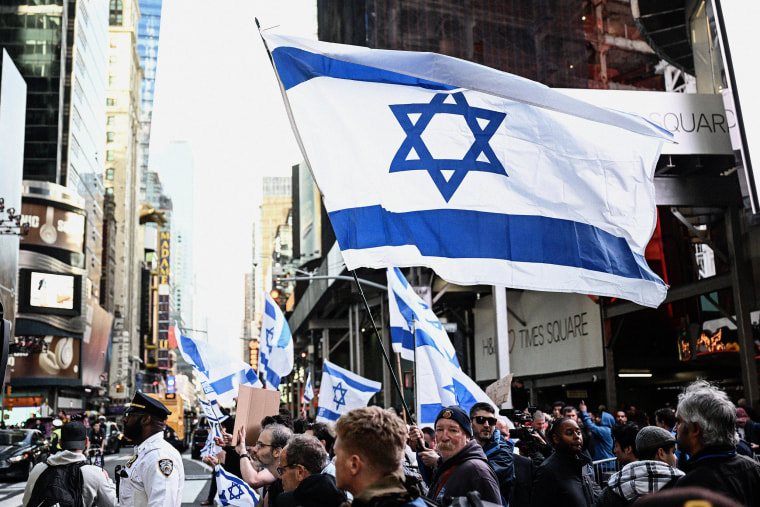 A group of pro-Israel demonstrators gather to protest people attending a Pro-Palestinian demonstration at Times Square in New York, United States on October 13