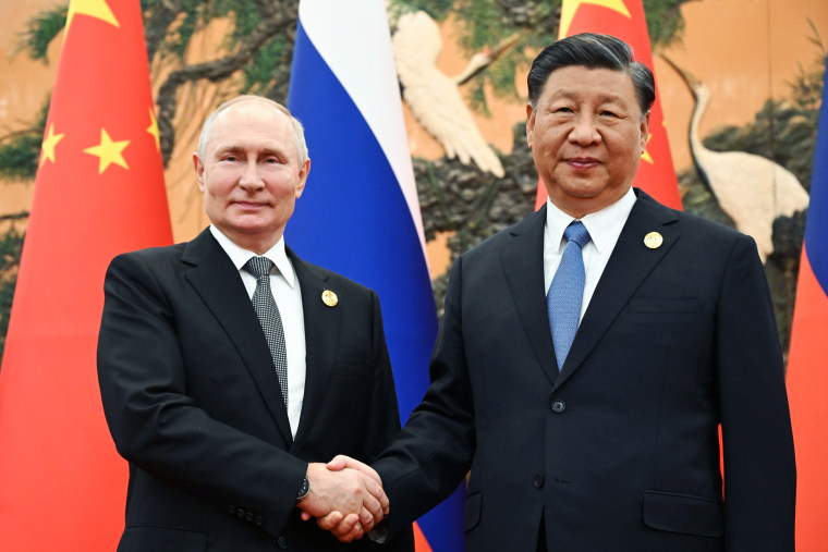 Putin and Xi meet in China