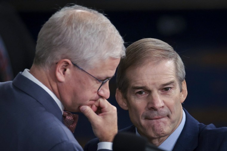 Rep. Jim Jordan, R-Ohio, talks with Speaker Pro Tempore Rep. Patrick McHenry, R-N.C.