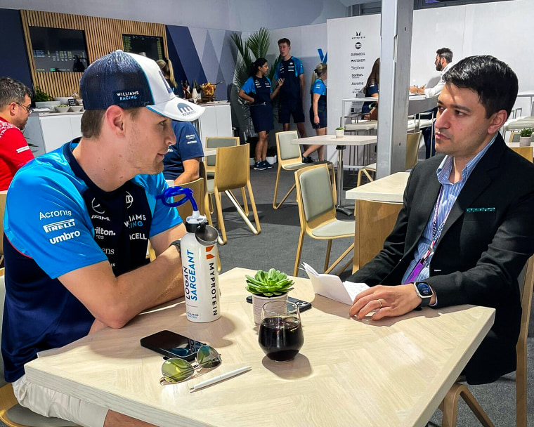 NBC News reporter Sahil Kapur speaks to Logan Sargeant of United States and Williams ahead of the F1 Grand Prix at Circuit of The Americas on Oct. 19, 2023 in Austin, Texas. 