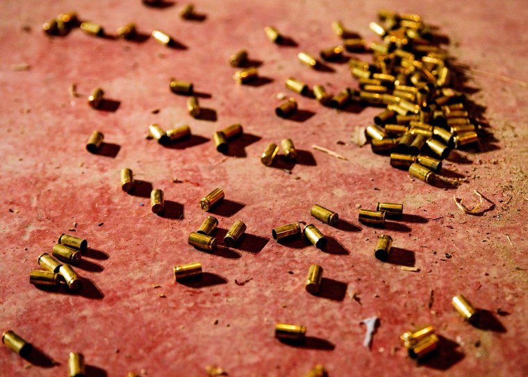 Used bullet shells on the floor of the gun range at Florida Gun Store in Hollywood, Fla