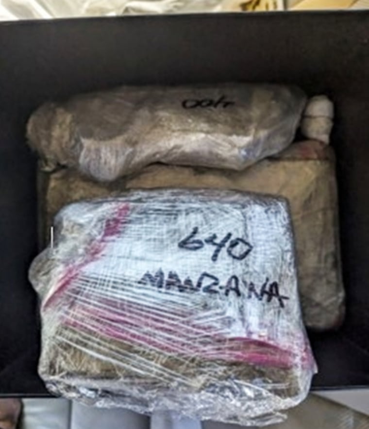 Evidence seized by authorities in connection with the arrest of an NYPD officer for allegedly selling fentanyl and heroin.