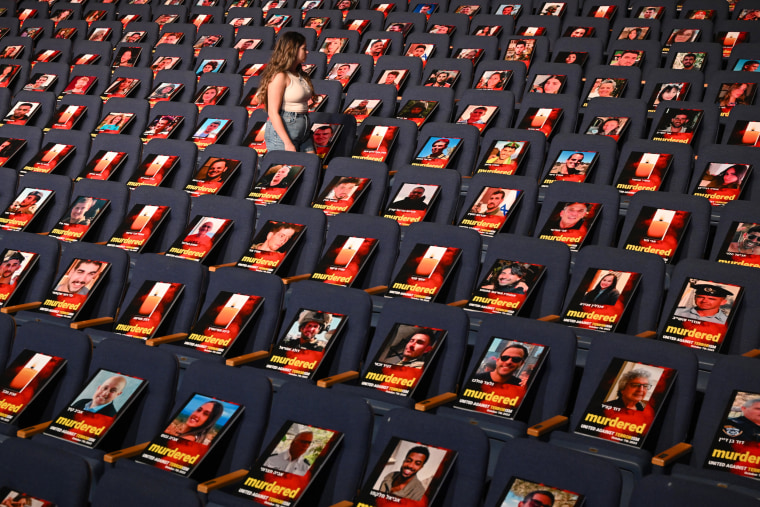 Pictures of over 1,000 persons abducted, missing or killed in the Hamas attack are displayed on empty seats in the Smolarz Auditorium at Tel Aviv University on Oct. 22, 2023 in Tel Aviv, Israel. 